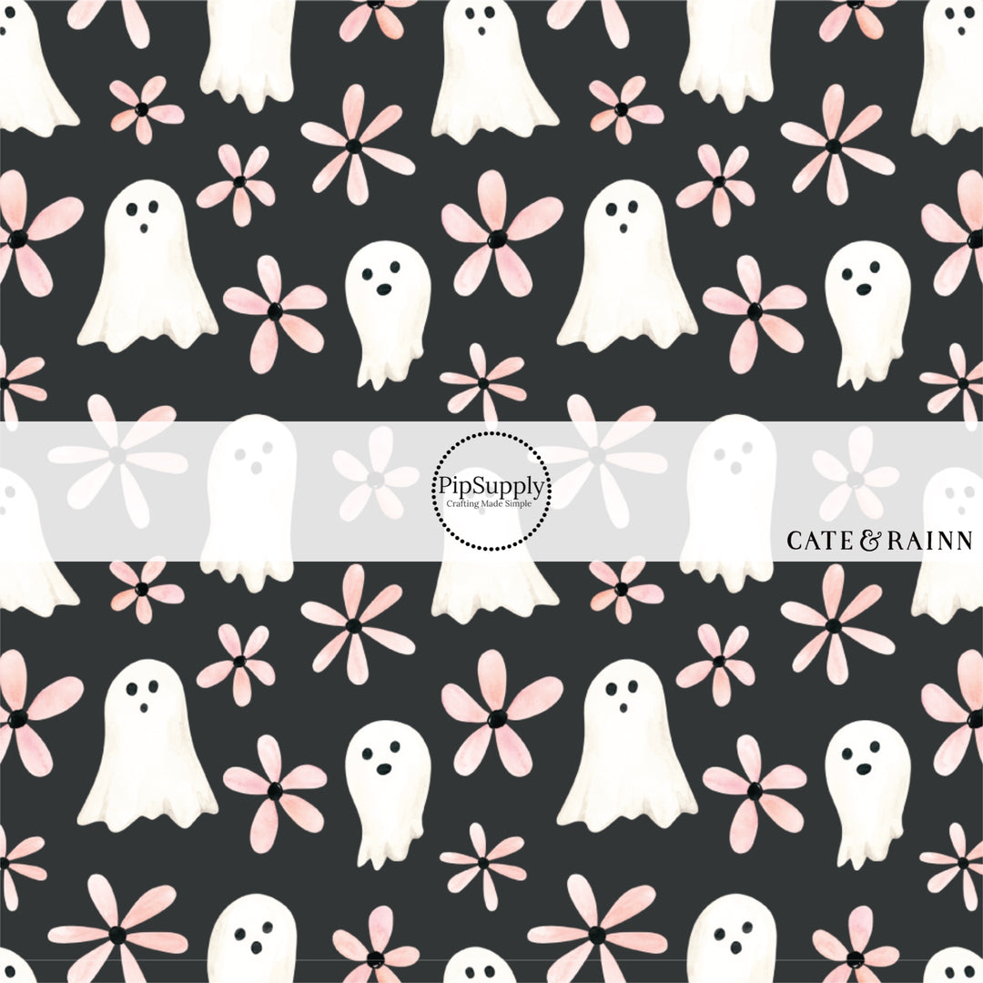 These Halloween themed black fabric by the yard features ghosts and floral pink daisies on black. This fun spooky themed fabric can be used for all your sewing and crafting needs!