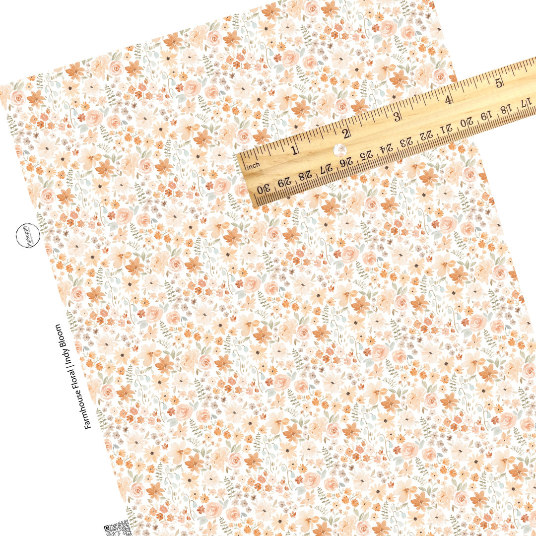 These neutral watercolor flowers on white faux leather sheets contain the following design elements: flowers in the colors of light pink, peach, light blue, olive, tan, and cream.