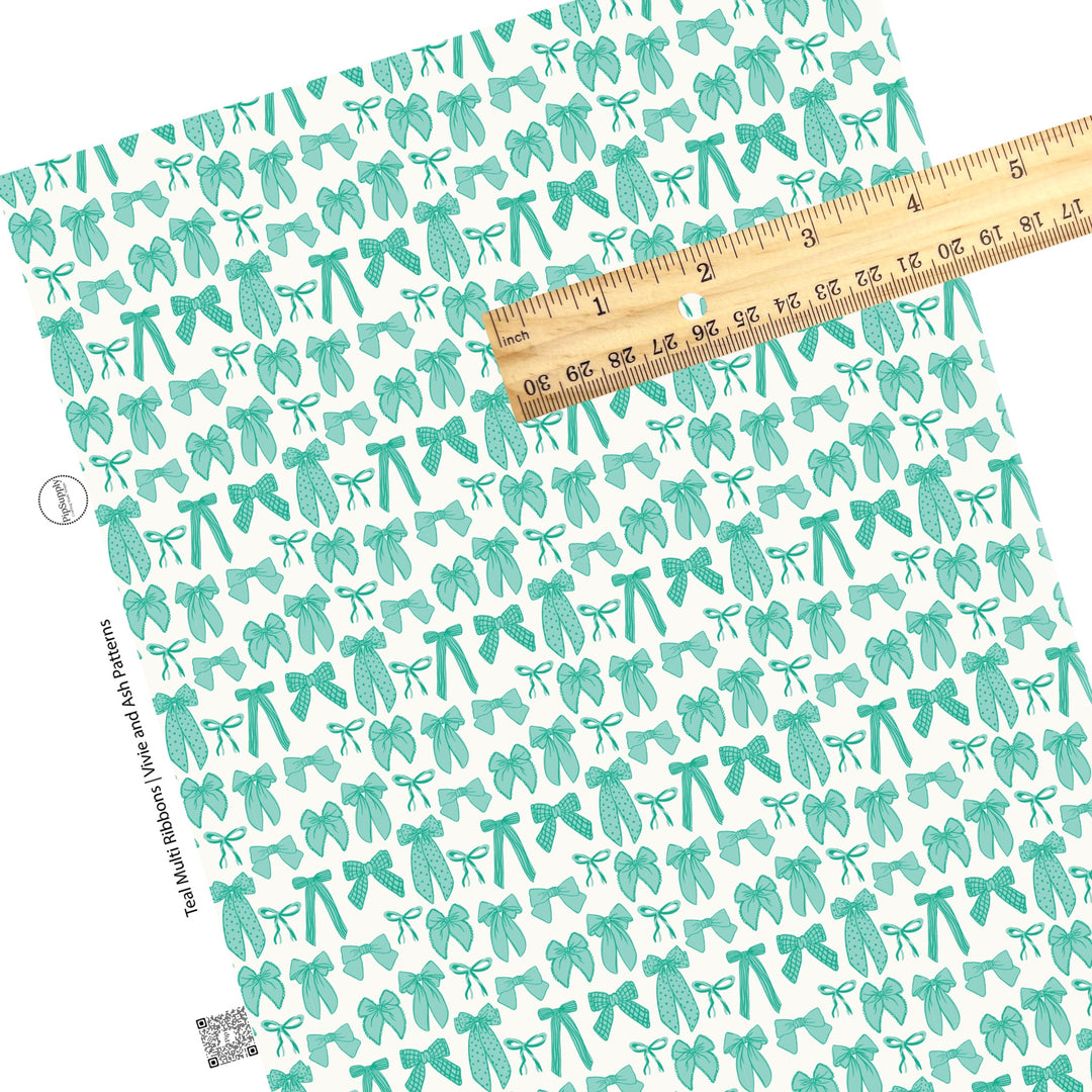 These spring bows faux leather sheets contain the following design elements: teal multi ribbon bows. Our CPSIA compliant faux leather sheets or rolls can be used for all types of crafting projects.