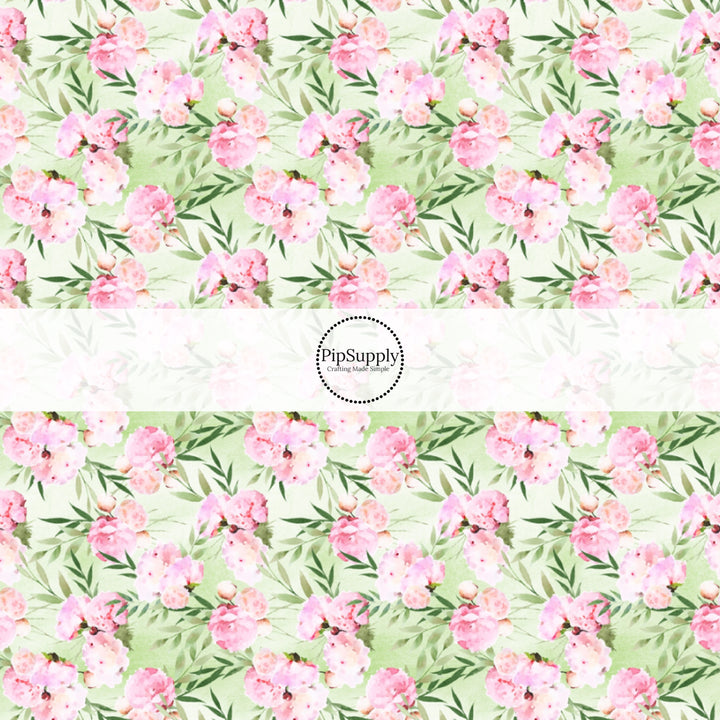 This floral themed fabric by the yard features pink and green wicked flowers. This fun pattern fabric can be used for all your sewing and crafting needs!