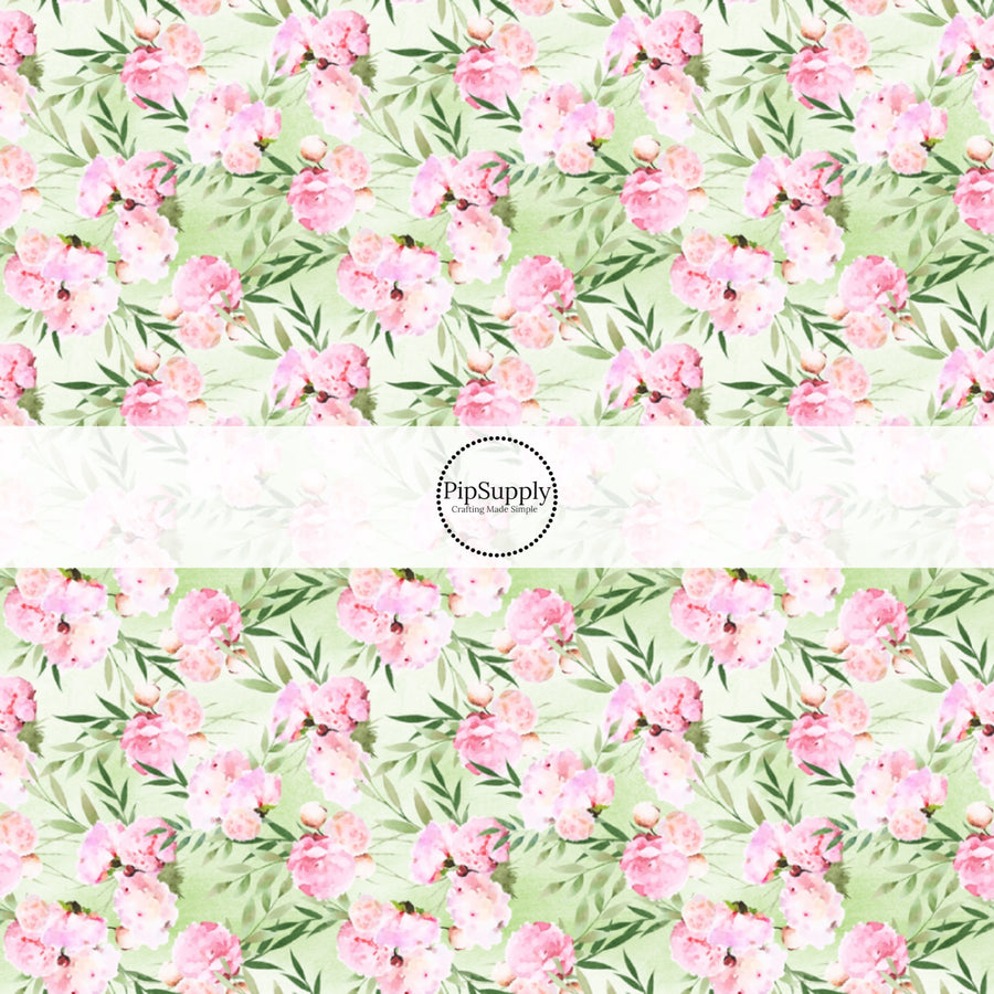 This floral themed fabric by the yard features pink and green wicked flowers. This fun pattern fabric can be used for all your sewing and crafting needs!