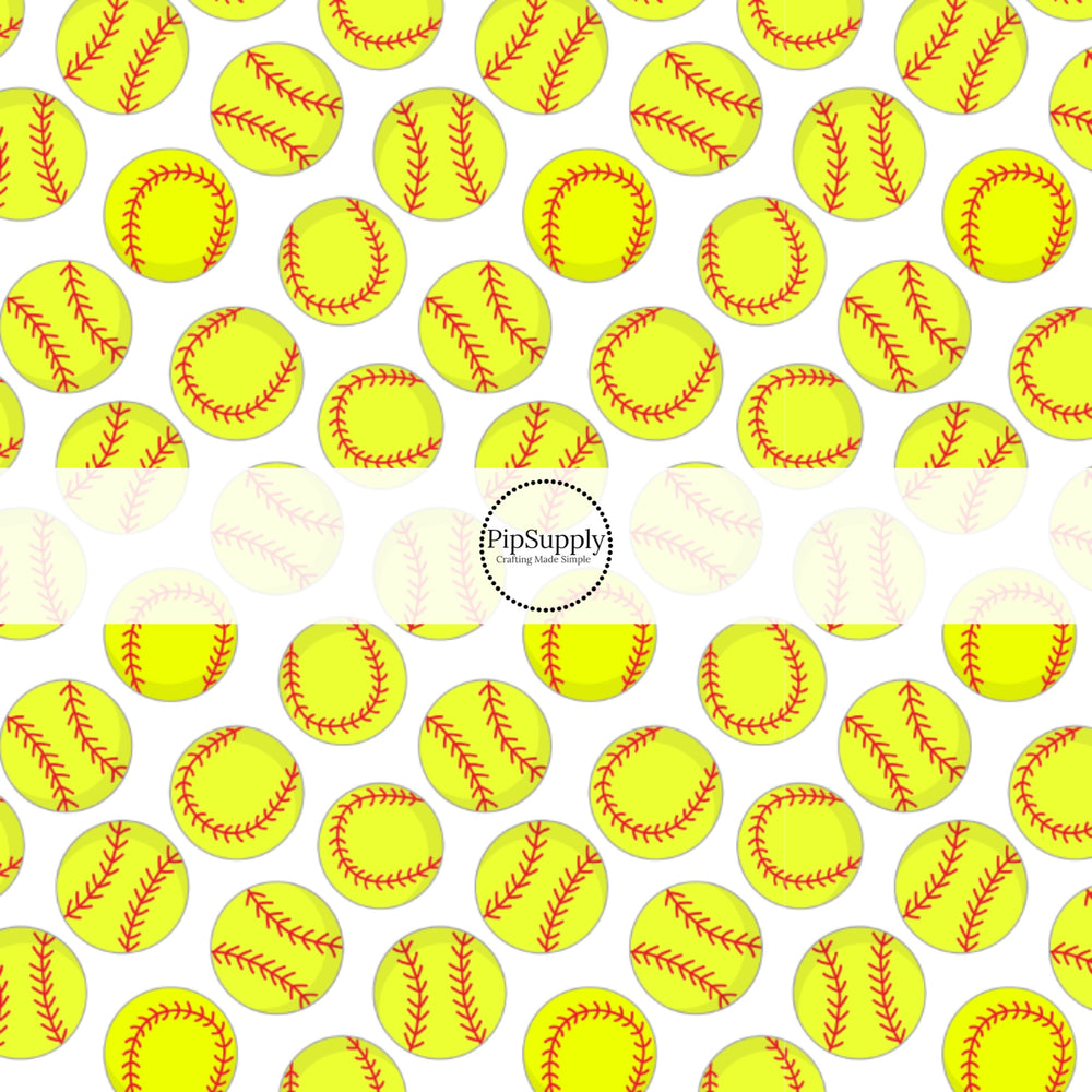 Scattered softballs on white bow strips