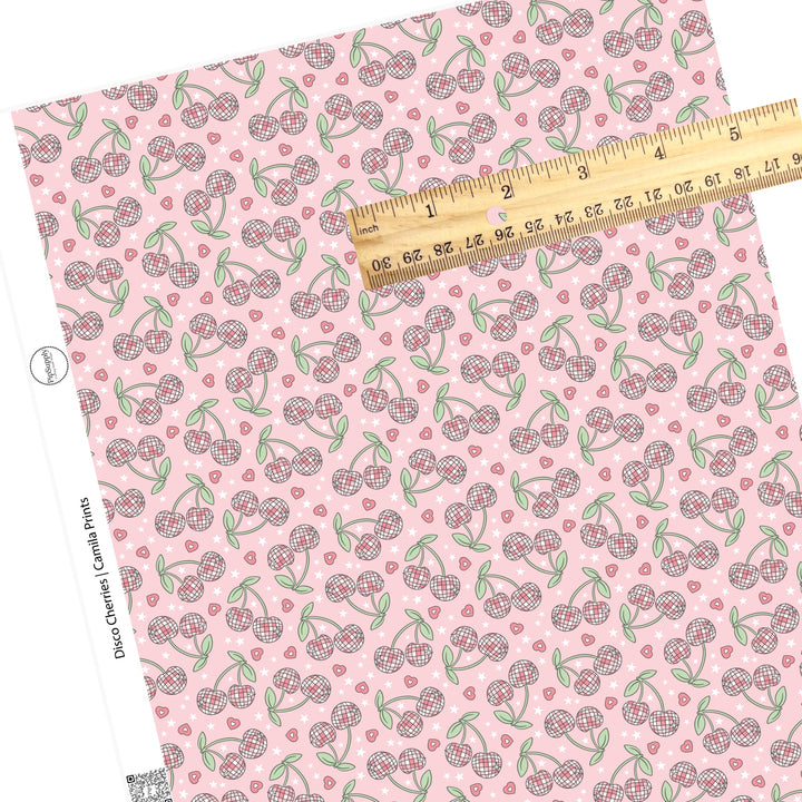 Pink hearts with disco cherries on pink faux leather sheets