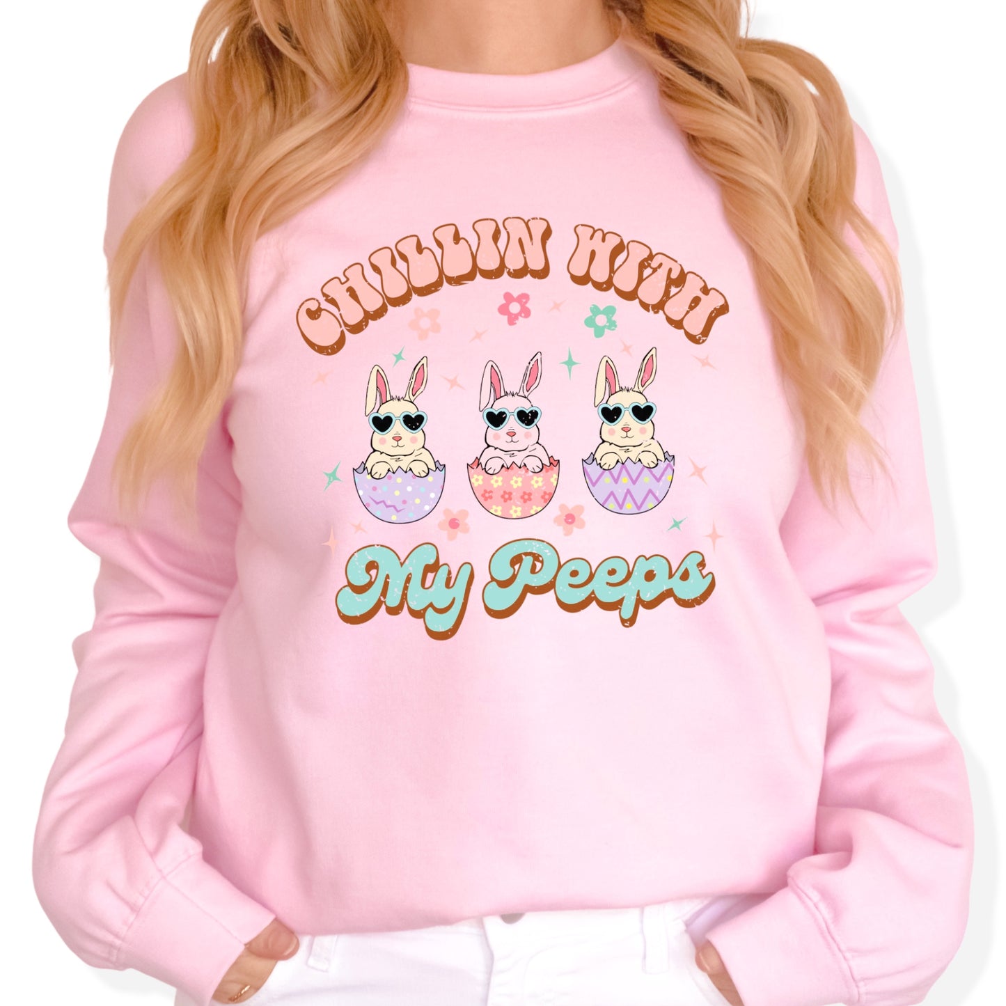 Easter Heat Transfer - Three bunnies sitting in cracked eggs with heart sunglasses and the words chillin with my peeps. The DTF design features Pink, Lavender and Aqua. Sublimation Transfers.
