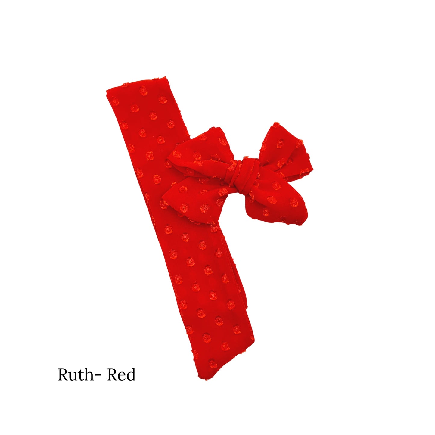 Red frayed christmas bow with dots on a white background