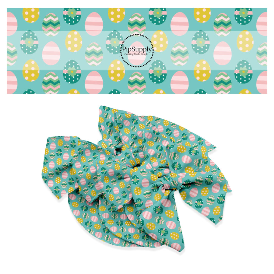 Pink egg with stripes, yellow egg with pink polka dots, green and pink chevron egg, teal egg with white polka dots and green flowers on teal bow strips