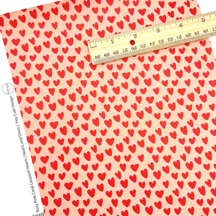 Valentine Faux leather sheet with red hearts on a peach background