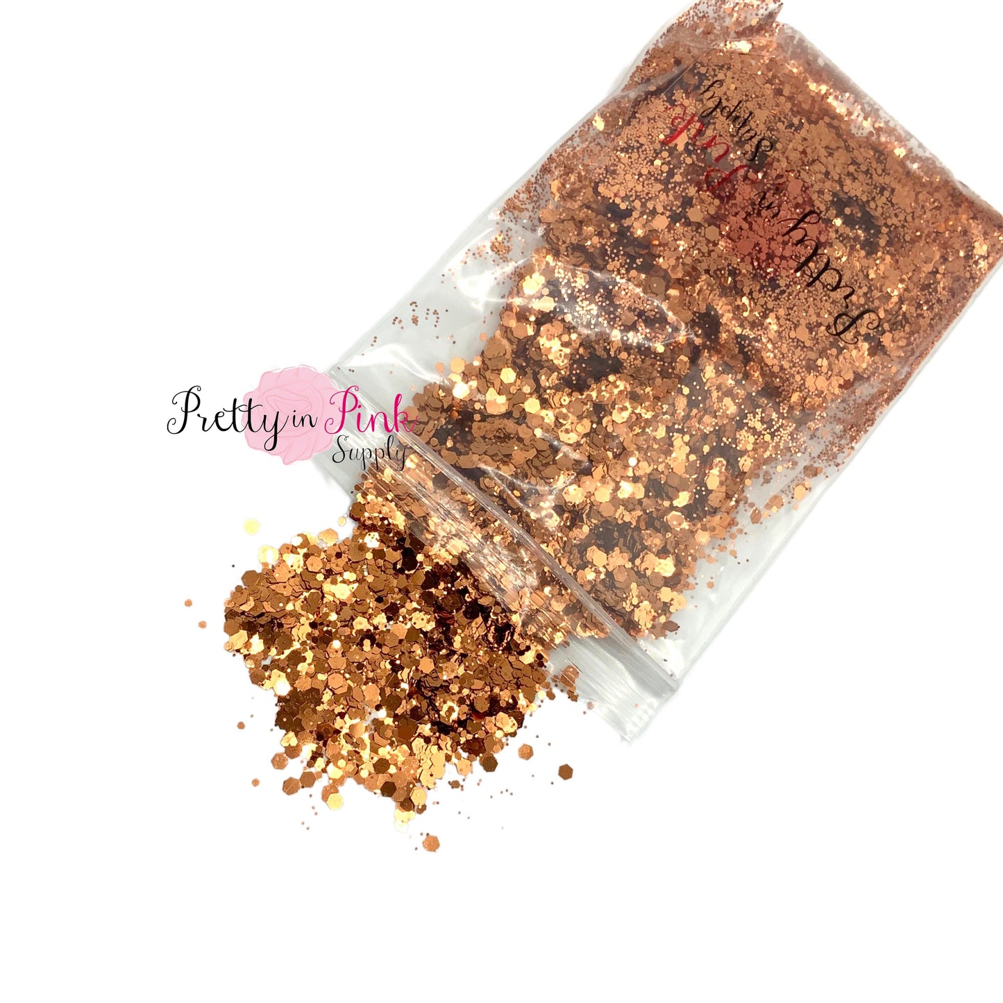 Spilling bag of copper metallic chunky glitter and fine glitter mix.
