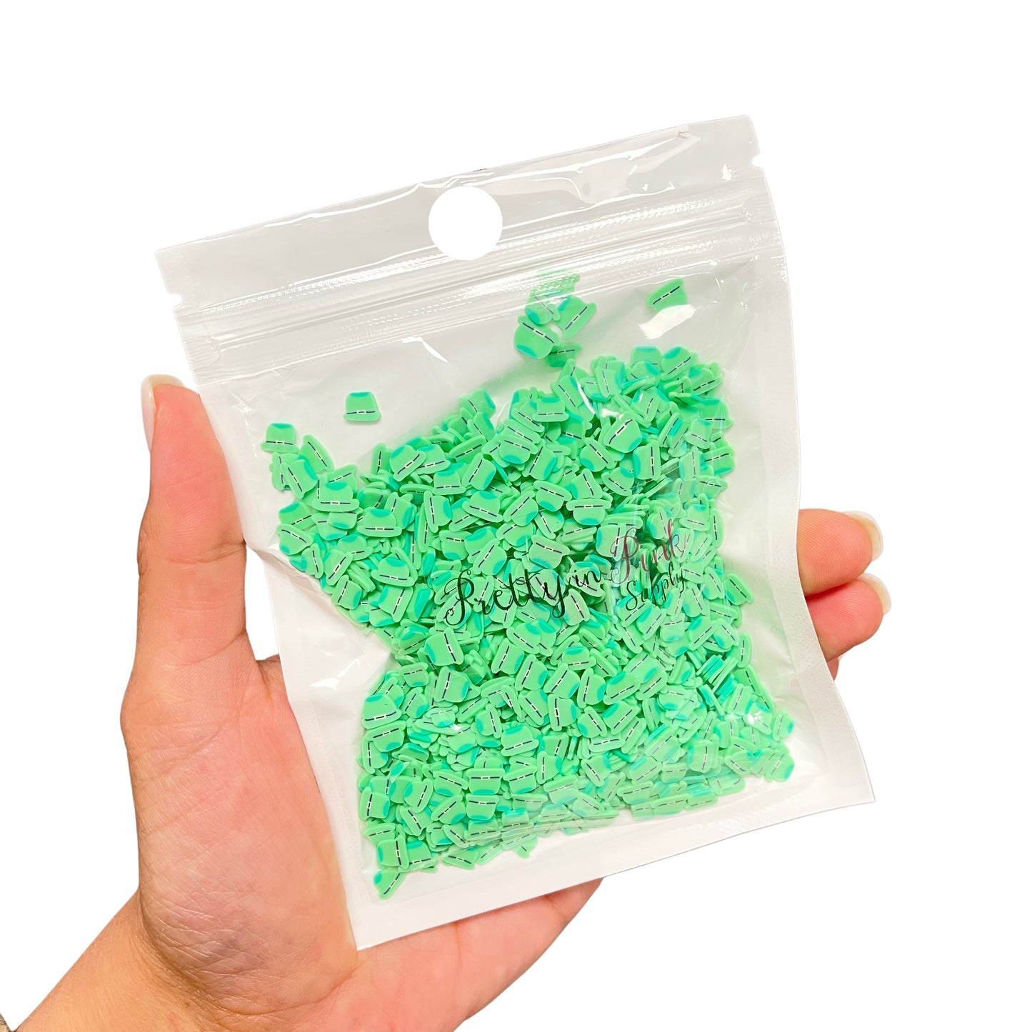 Resealable bag of St. Patrick's Day leprechaun hat polymer clay slices..