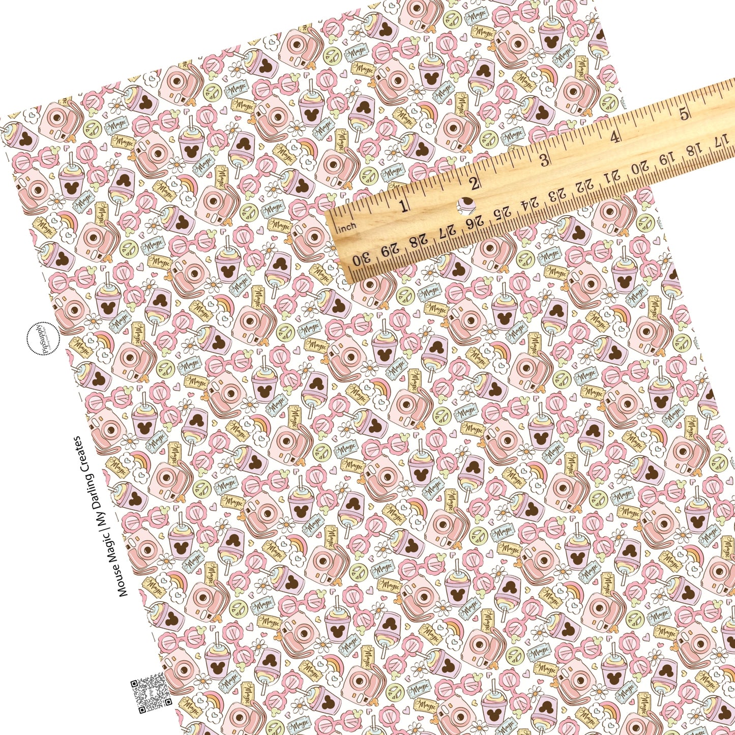 Mouse magic and fun vacation things on pink faux leather sheet.