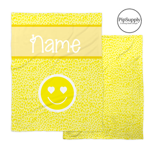 Bright yellow leopard print patterned soft minky blanket with smiley face and customizable text.