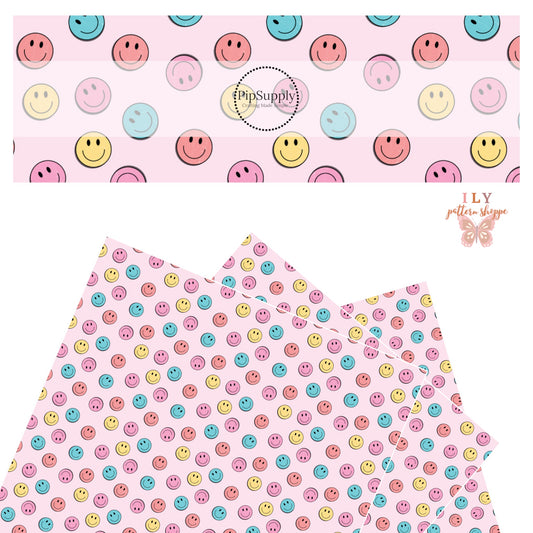 Coral, blue, pink, and yellow smiley faces on a light pink faux leather sheet
