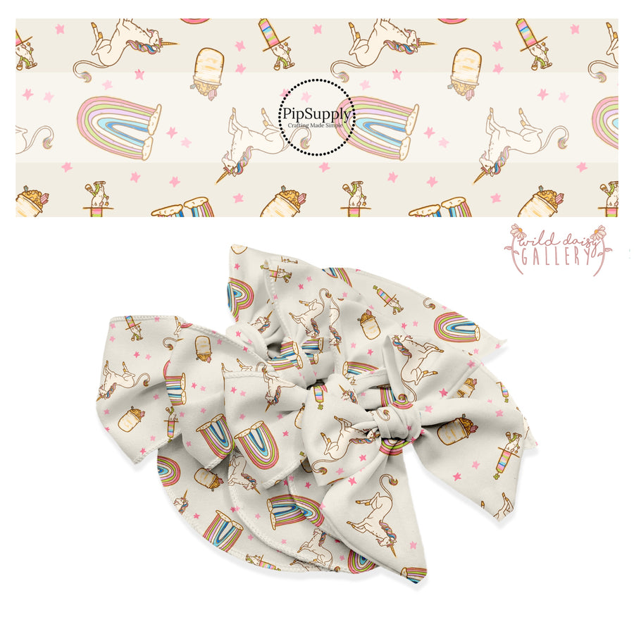 Unicorn with rainbow hair and multi colored rainbows with pink stars on a cream bow strip