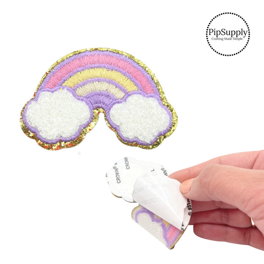 Purple Rainbow chenille adhesive patch with pink, and yellow stripes and white clouds