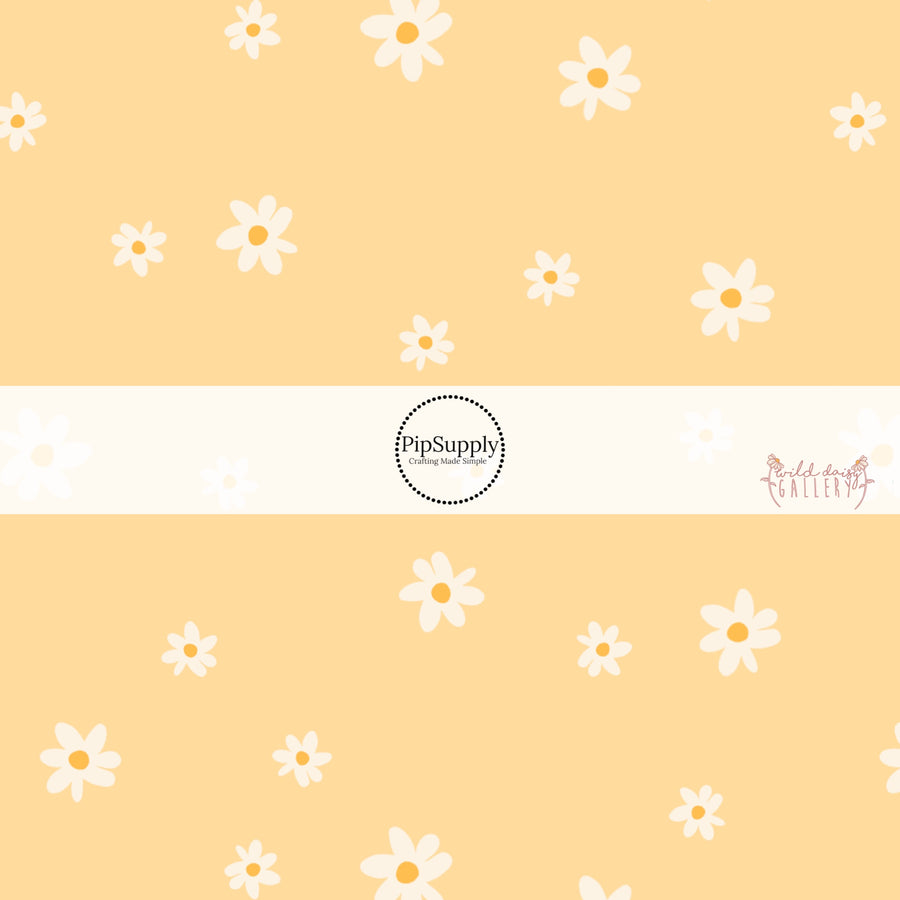 Pale yellow fabric by the yard with white scattered daisies