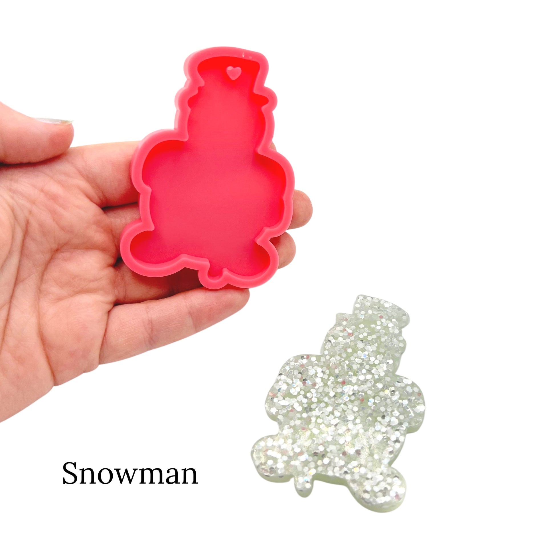 Sparkly christmas resin mold used for crafts on a white background 