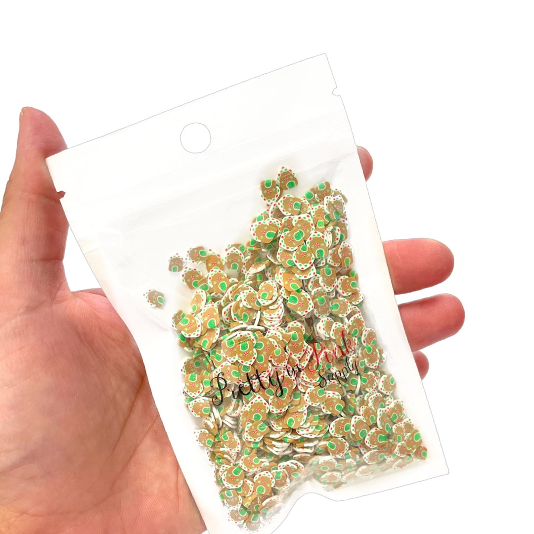 Bag of Christmas gingerbread house polymer clay slices.