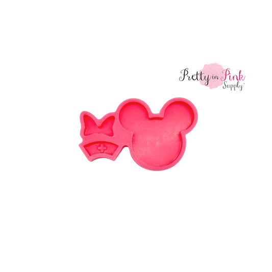 Pink silicone mouse ear mold with nurse hat and bow for resin.