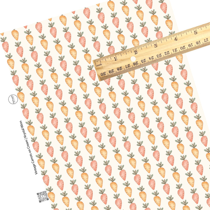 rows of orange and peach carrots on cream faux leather sheets