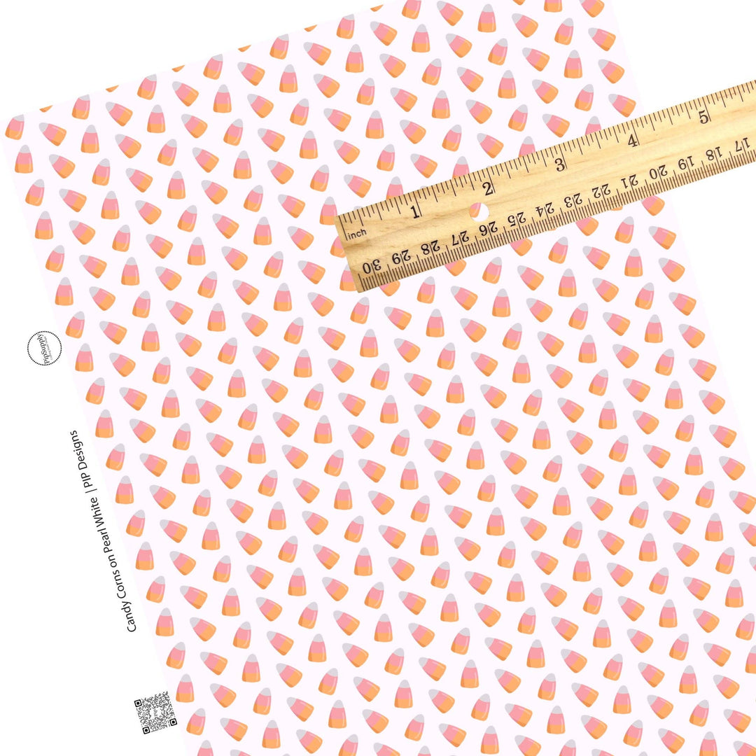 Candy Corns on Pearl White Faux Leather Sheets