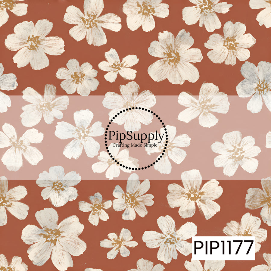 A warm, minimalist floral print featuring loosely painted ivory and cream blossoms scattered across a rich terracotta background. The flowers vary in size and shape, with visible brushstroke details that give each bloom a soft, hand-painted texture. Subtle touches of warm tan and muted gray add dimension to the petals while keeping the palette beautifully understated. The earthy rust backdrop paired with creamy florals creates a cozy, vintage-inspired look with a modern boho feel.
