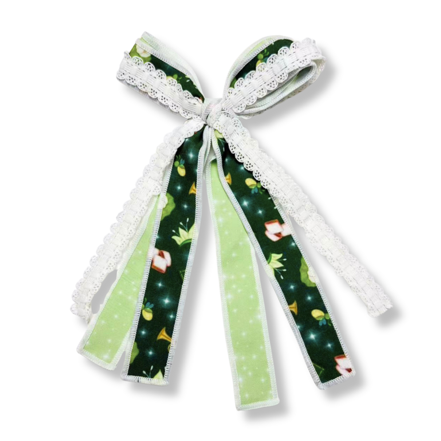This boutique bow features layered mint green and deep emerald green ribbons adorned with whimsical bayou-inspired details, including water lilies, brass instruments, and storybook accents. Soft mint sparkle ribbon adds a magical touch, while intricate white lace trim frames the bow for a vintage, heirloom feel. The flowing tails and elegant knot create a graceful silhouette, making this design perfect for princess-inspired outfits, special occasions, and enchanting everyday wear.
Bow Sizing 4" x 8