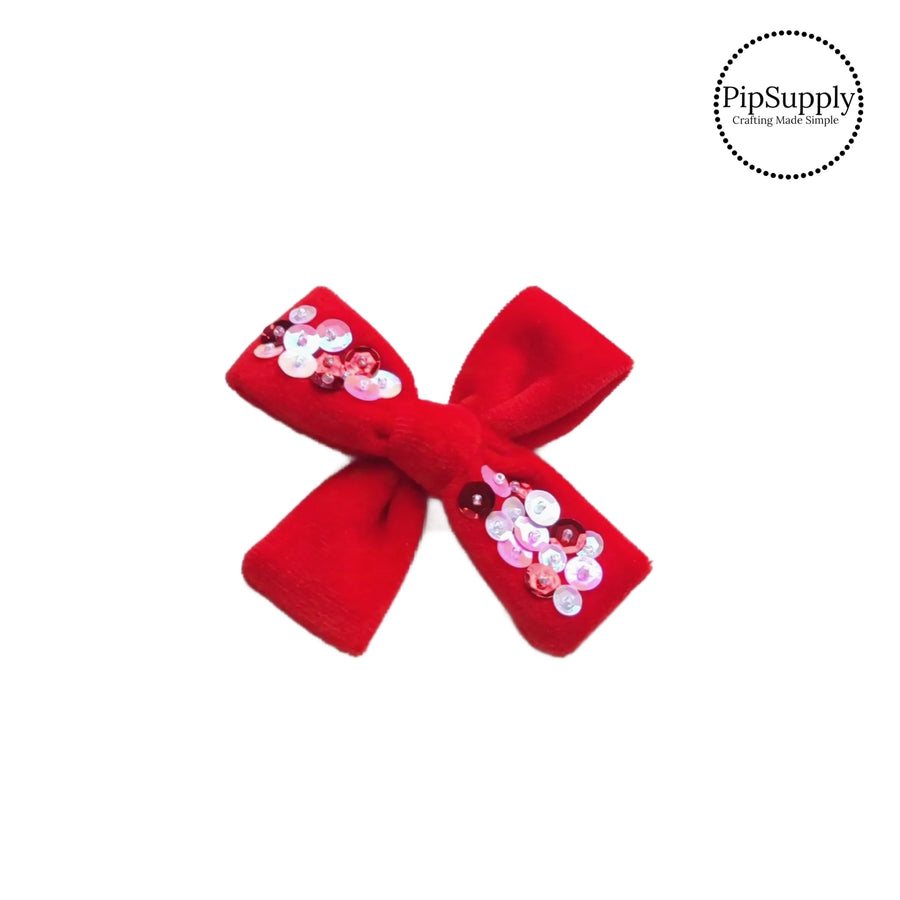 Theses red velvet multi sequin ruth hair bows are ready to package and resell to your customers no sewing or measuring necessary! These come pre-tied with an attached alligator clip. The Valentine themed bow is perfect for all hair styles for kids and adults.