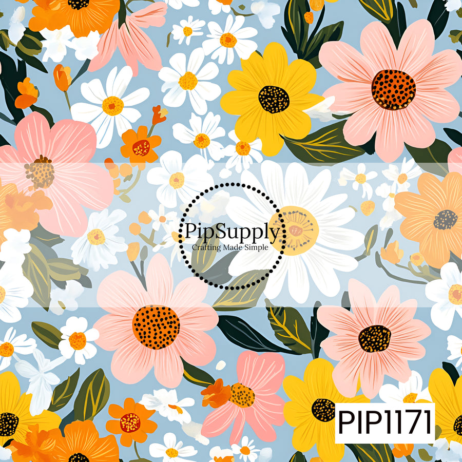 A cheerful floral pattern featuring oversized pink and golden yellow blooms, crisp white daisies, pops of orange, and deep green leaves on a soft sky blue background.
