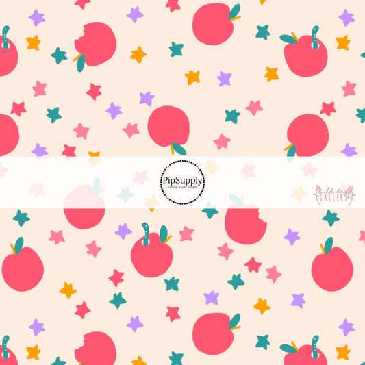 Light pink fabric by the yard with pink apples and worms, as well as orange, pink, purple, and teal stars.