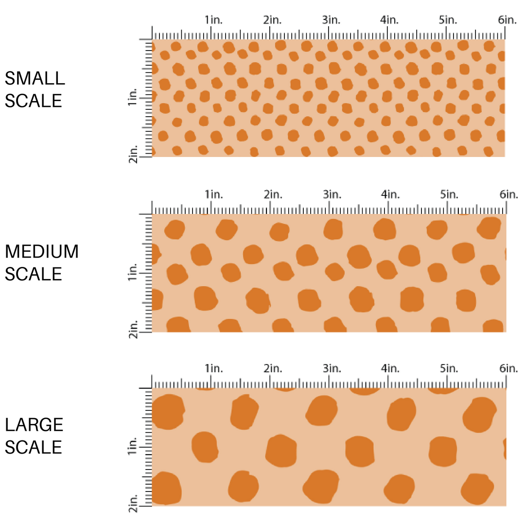 Beige fabric by the yard scaled image guide with apricot speckled dots.