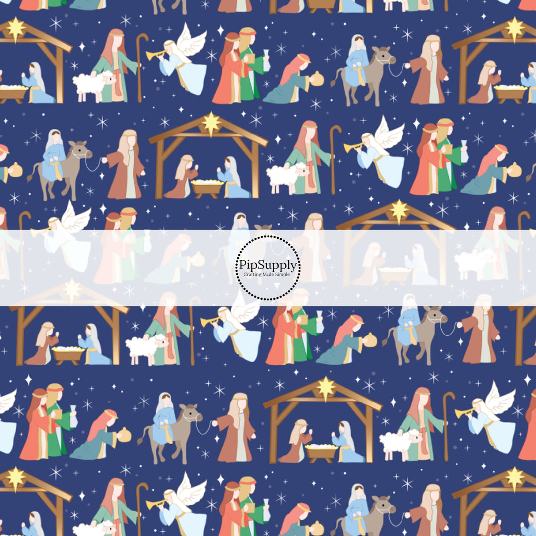 Navy blue fabric by the yard with the nativity scene design.