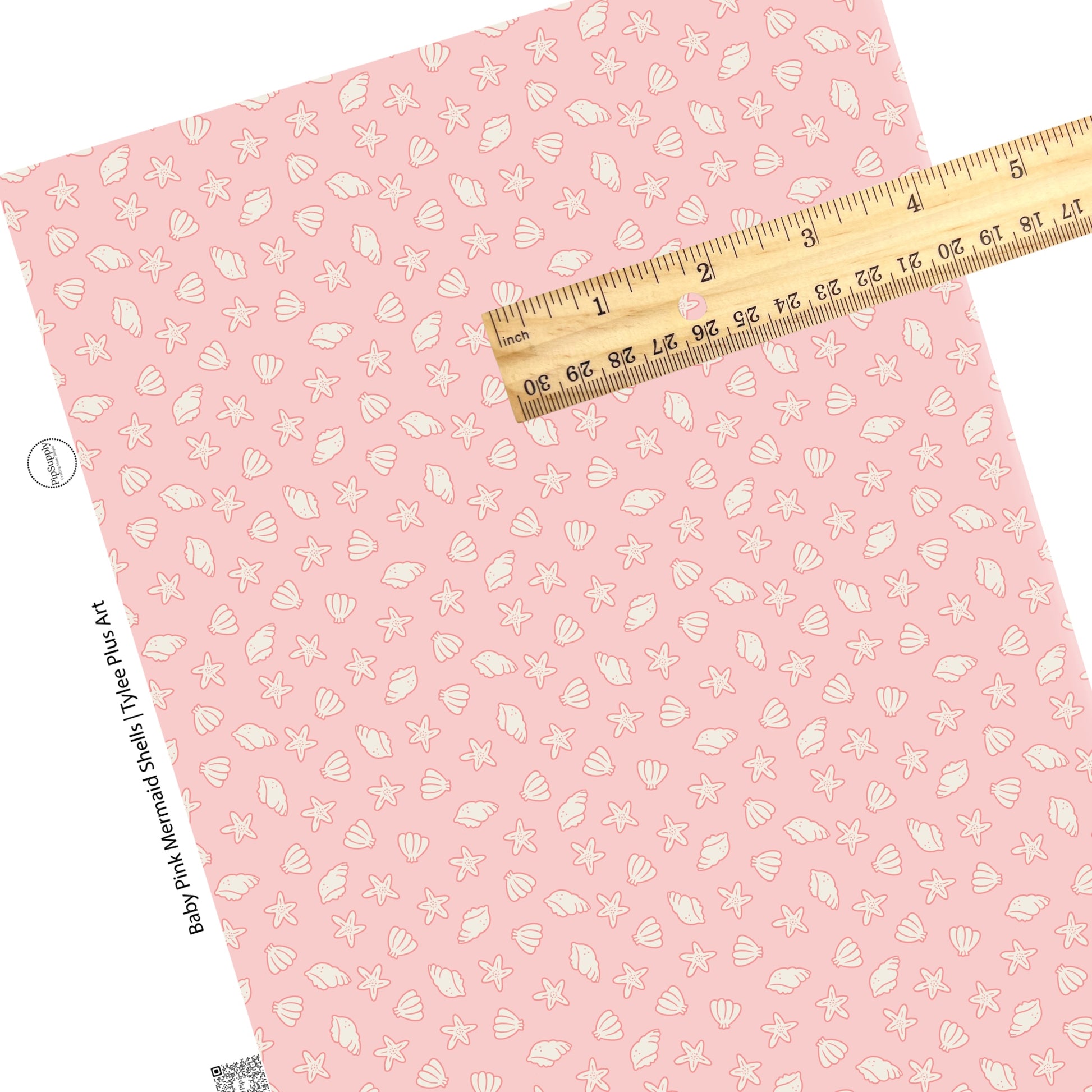 These beach faux leather sheets contain the following design elements: seashells on light pink. Our CPSIA compliant faux leather sheets or rolls can be used for all types of crafting projects.
