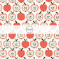 Cream fabric by the yard with sliced red apples.