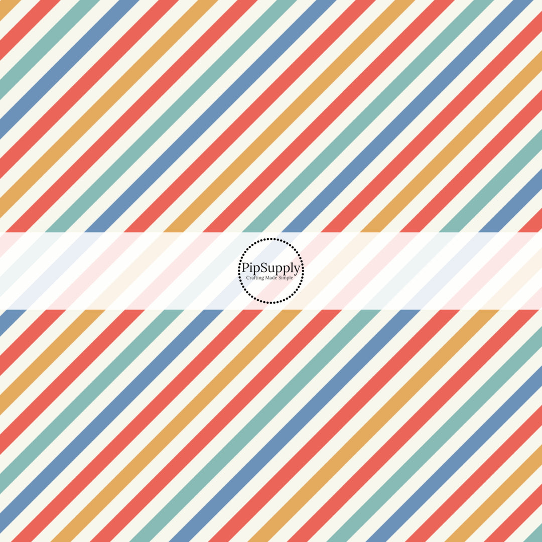 Red, yellow, blue, and aqua diagonal stripes on white fabric by the yard.