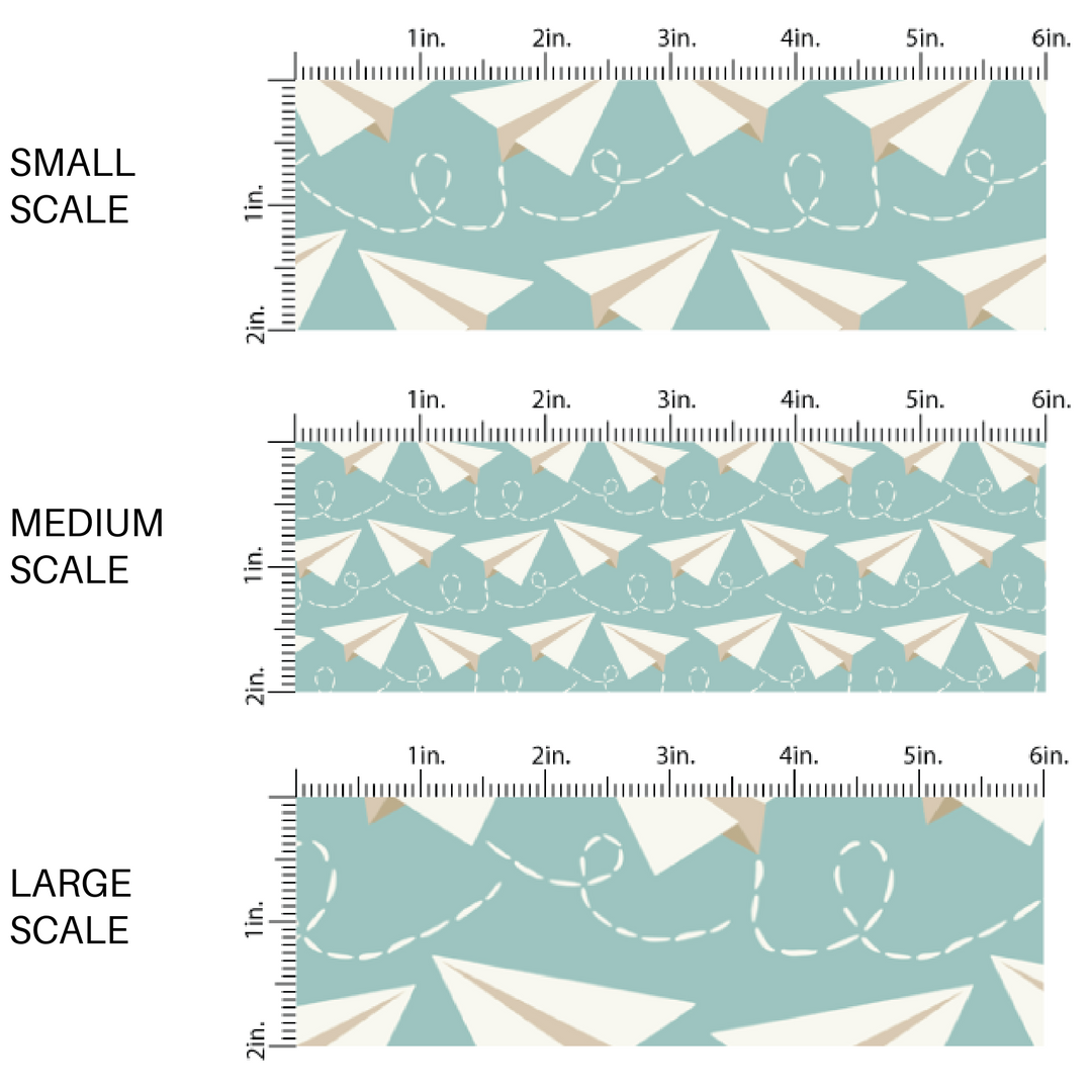 Light aqua fabric by the yard scaled image guide with white paper airplanes.