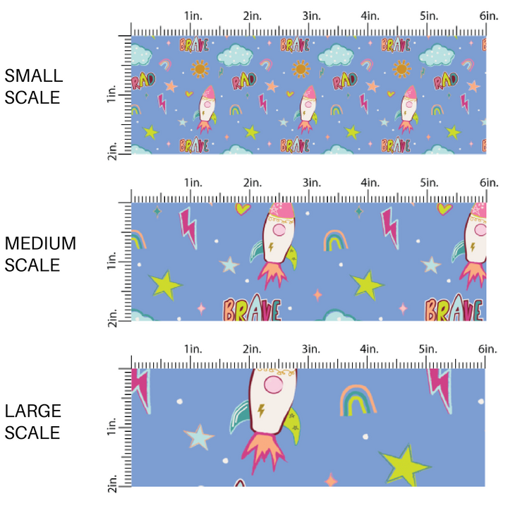 Powder Blue fabric by the yard Scaled image guide with stars, space ships, rainbows, and other sky an outer space designs.