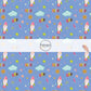 Powder Blue fabric by the yard with stars, space ships, rainbows, and other sky an outer space designs.