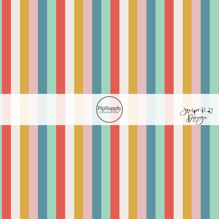 Red, white, yellow, pink, and blue vertical striped fabric by the yard.