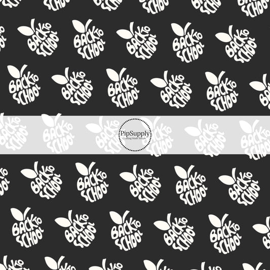Black fabric by the yard with white "Back to school apples"