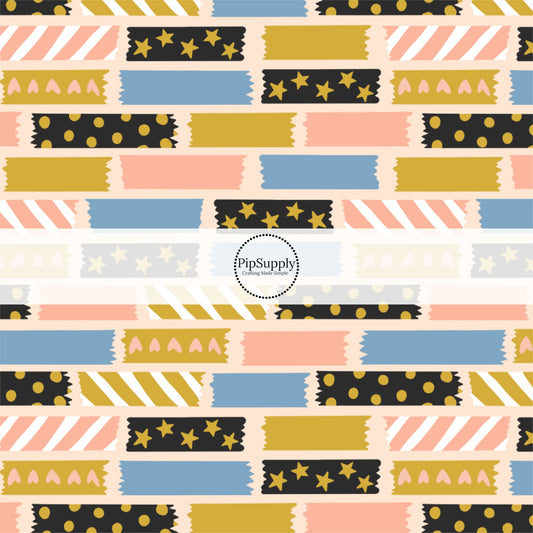 Cream fabric by the yard with heart and star patterned washi tape.