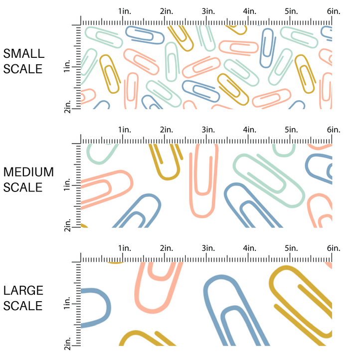 Peach, yellow, aqua, and blue paper clips on white fabric by the yard scaled image guide.