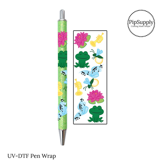 Green frog and pink lily pad with musical instruments inspired by the bayou princess.  DIY pen wrap uv dtf.
