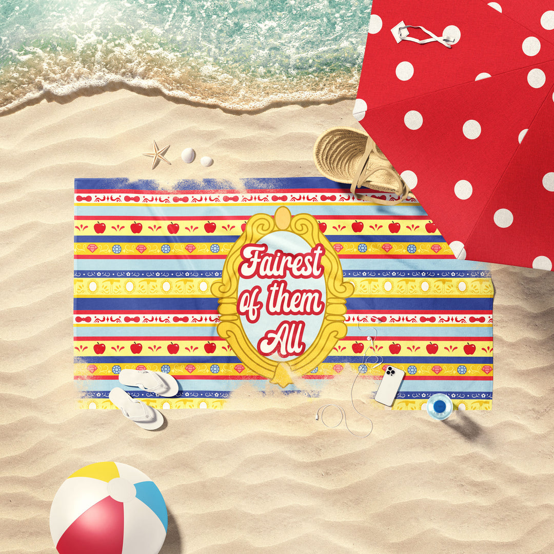 Red, Royal Blue, and yellow princess stripe print beach towel at the beach.