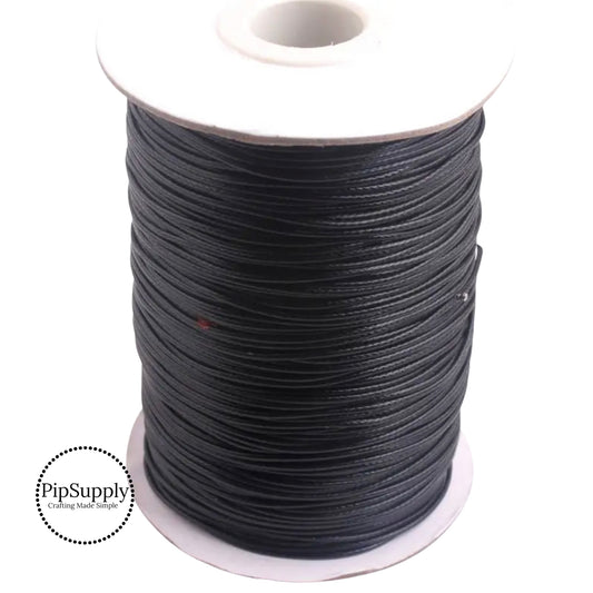 Black nylon cord by the yard, used for jewelry and other DIY crafts.