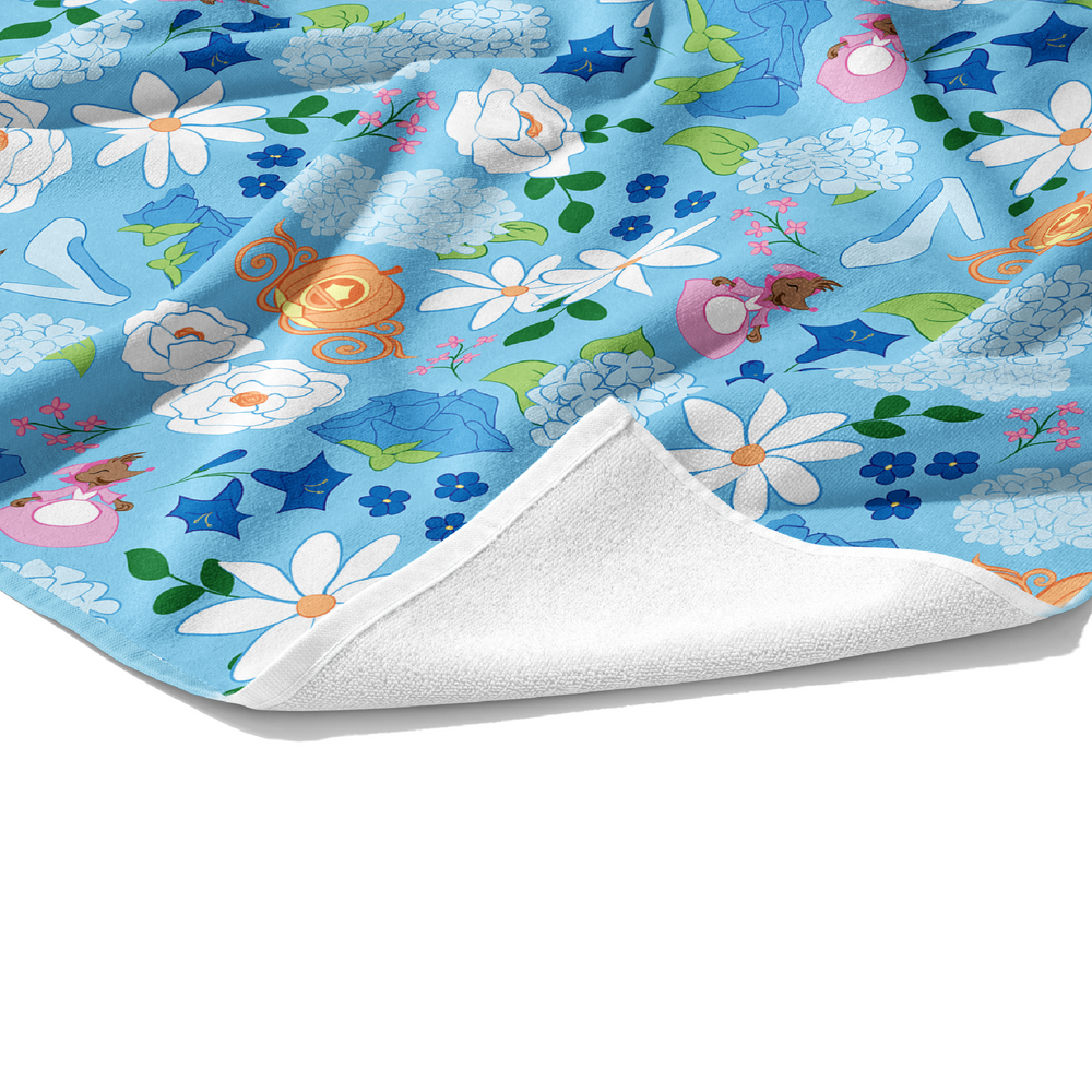 Plush beach towel with hydrangea and daisy floral with princess glass slipper and pumpkin carriage pattern.