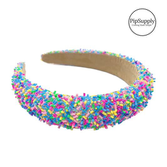 These blue glitter headbands are a stylish hair accessory and have the on and off ease of a headband. These spring party themed headbands are a perfect simple and fashionable answer to keeping your hair back! The headbands feature glitter and bright sprinkle mix.