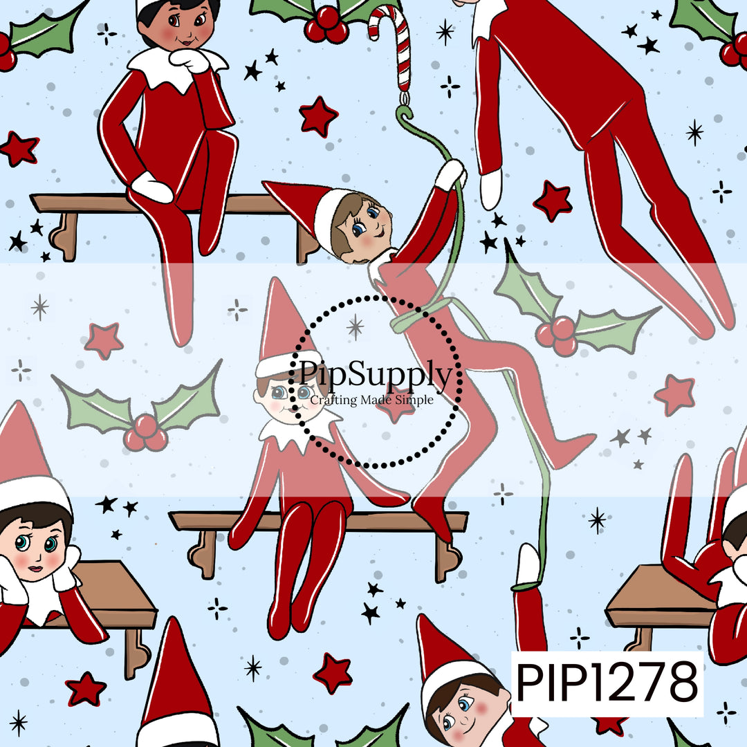 A whimsical holiday pattern filled with playful elves in classic red and white outfits getting into all kinds of mischief. The elves are shown sitting on shelves, climbing, dangling from candy canes, lounging, and striking silly poses. Festive holly and berries, candy canes, red stars, tiny sparkles, and scattered dots fill the soft light blue background for a fun and cheerful Christmas look.
