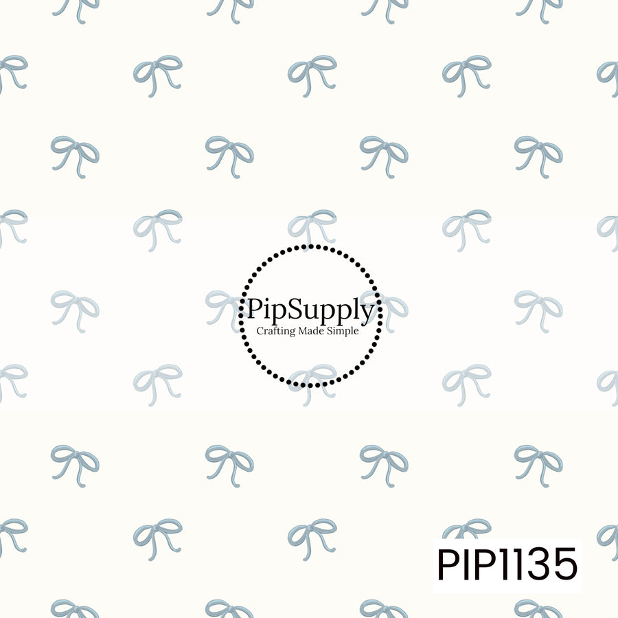 A delicate repeating pattern of dusty blue ribbon bows scattered across a soft ivory background, creating a sweet and minimalist coquette look.
