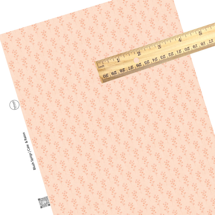 These flower pattern themed faux leather sheets contain the following design elements: pink sprigs on light pink. Our CPSIA compliant faux leather sheets or rolls can be used for all types of crafting projects.