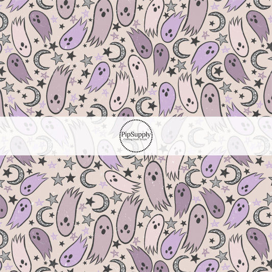 Purple ghosts, silver stars, and silver moons on gray fabric by the yard.